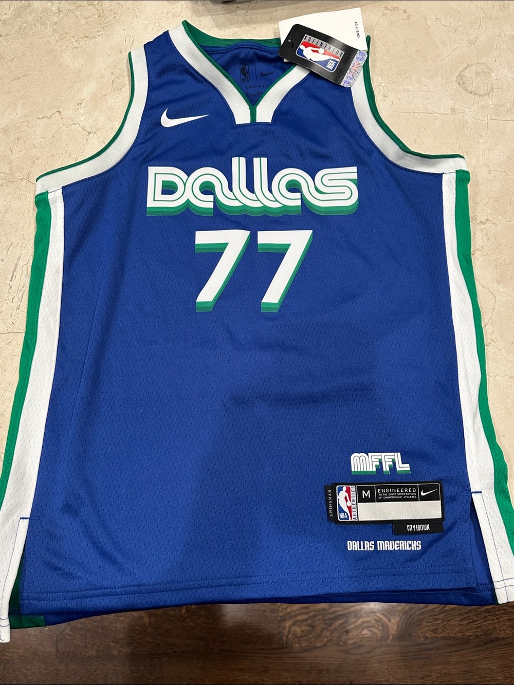 Boys Nike Blue Dallas Basketball Jersey with Green & White Accents